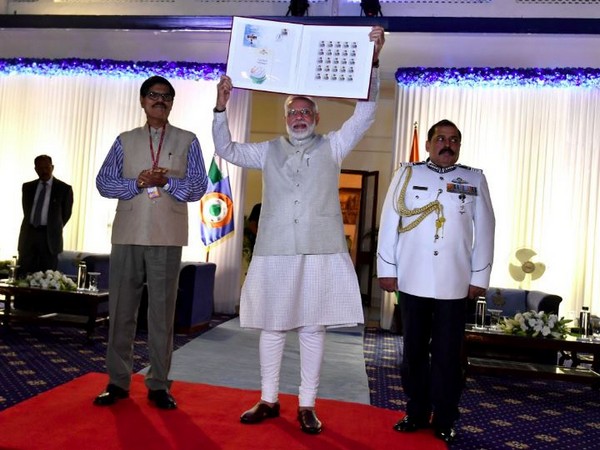 PM Modi releasing commemorative stamp in honour of Marshall of IAF Arjan Singh. (Photo/Narendra Modi twitter account)