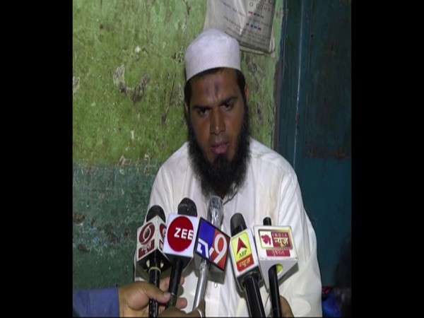 Mohammad Yusuf talking to media persons. 