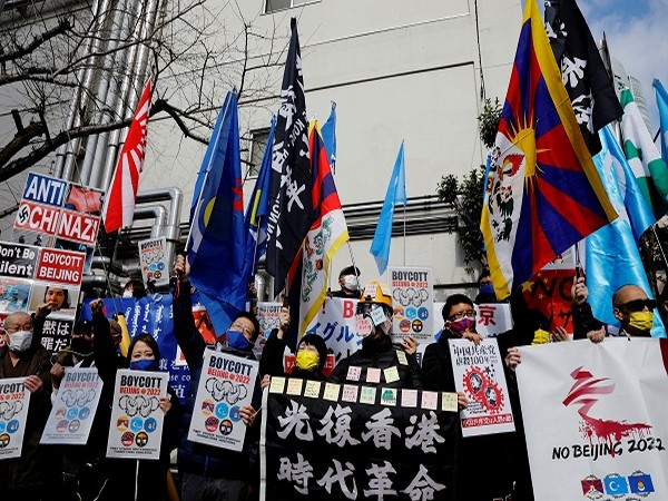 Protesters attend a rally against the 2022 Beijing Winter Olympic Games near the Chinese embassy in Tokyo, Japan. (Photo Credit: Reuters)