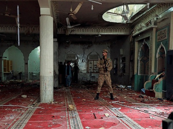 An army soldiers stands amid the damage at the prayer hall after a bomb blast inside a mosque during Friday prayers in Peshawar Pakistan, March 4, 2022. (Photo Credit: Reuters)