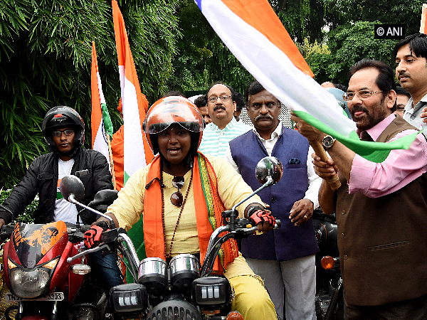 Union Minister Mukhtar Abbas Naqvi flagging off the bike rally to Kashmir in New Delhi on Sunday. Photo/ANI