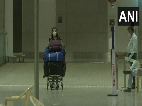 One of the 225 passengers of Air India's repatriation flight AI-1377, at Chhatrapati Shivaji International Airport, which arrived from Kuala Lumpur (Malaysia).