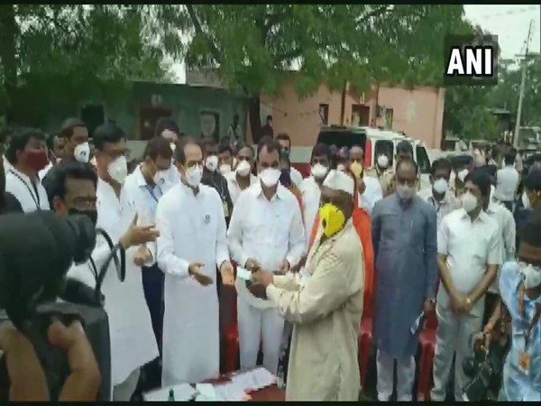 Maharashtra Chief Minister Uddhav Thackeray distributing relief cheques on Monday. [Photo/ANI]