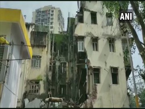Some parts of the a multi-storey building collapsed on Wednesday at ST Building Chowk near Ratnadeep Bar in Dongri area of Mumbai. [Photo/ANI]