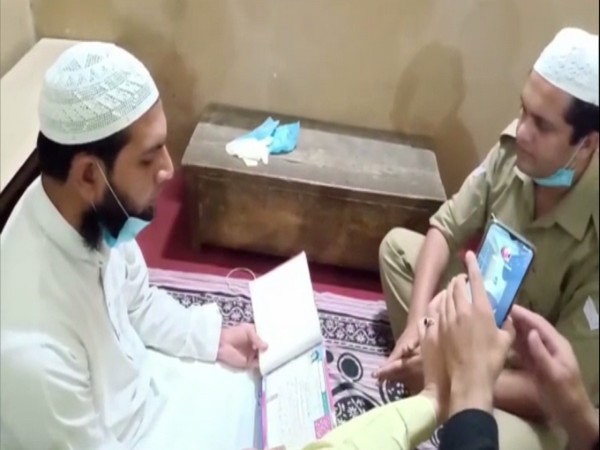 Police Constable Mohsin Saifi reading his wedding vows. Photo/ANI