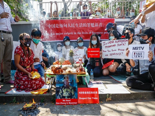 Myanmar civilians protesting against China on Friday. (ANI)