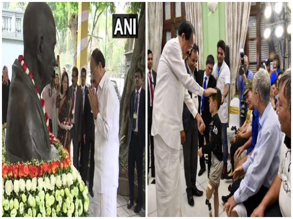 Vice President M Venkaiah Naidu paid tribute to Mahatma Gandhi and visited Jaipur Foot Artificial Limb Fitment Camp in Hanoi, Vietnam, on Saturday