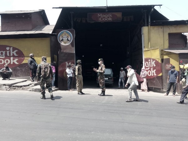 NCC of Shillong Group monitoring proper distancing during ration distribution amid coronavirus lockdown in Shillong. Photo/ANI