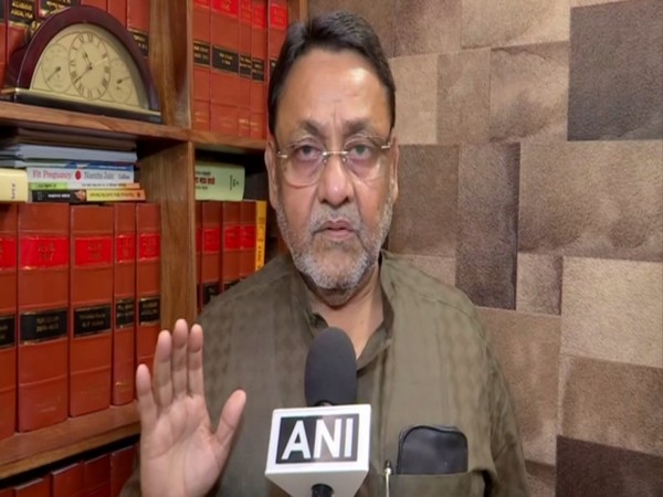 NCP leader Nawab Malik talking to ANI on Sunday in Mumbai. Photo/ANI