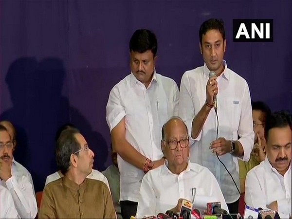 NCP MLAs Rajendra Shingane, Sandip Kshirsagar and Sunil Bhusara along with party chief Sharad Pawar and Shiv Sena chief Uddhav Thackeray at a joint press conference in Mumbai on Saturday.