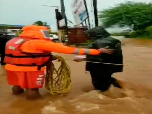 NDRF rescues people standed in floods due to rain in Maharashtra.