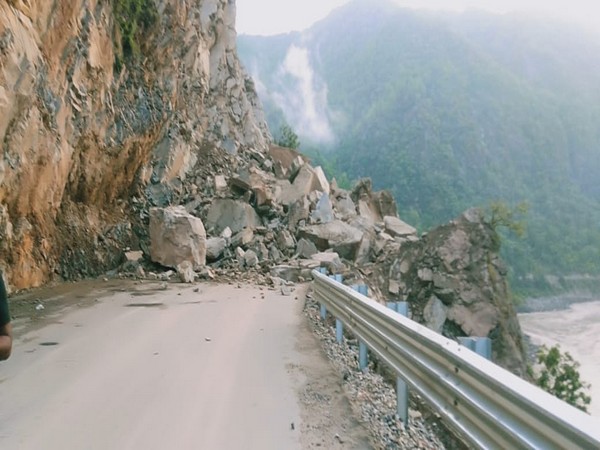 Visual of NH-58 blocked near Kodiyala due to debris and heavy boulders. (Photo/ANI)