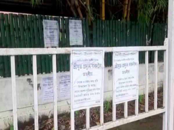 Posters targeting COngress MP posted in Nagaon, Assam. Photo/ANI