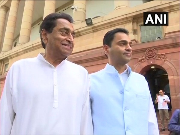 Madhya Pradesh Chief Minister Kamal Nath with son Nakul Nath in New Delhi (photo/ANI)