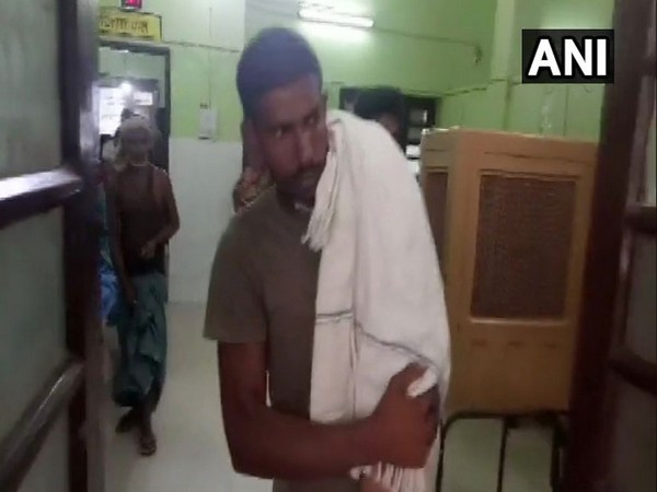 Video footage of man carrying his child on his shoulder