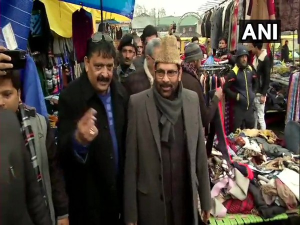 Union Minority Affairs Minister Mukhtar Abbas Naqvi at a market in Lal Chowk area of Srinagar on Wednesday.