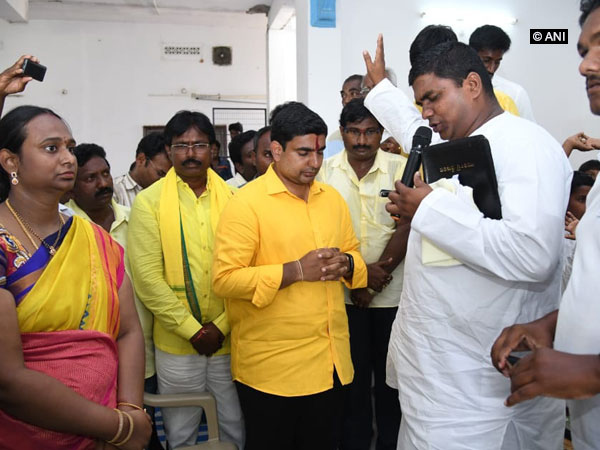 Andhra Pradesh IT Minister Nara Lokesh offering prayer at a church in Andhra Pradesh on Sunday. Photo/ANI
