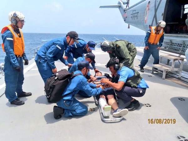 A Japanese crew member given medical attention by a medical team from Indian Navy off Mumbai on Friday. (Photo Credits: Navy Twitter)