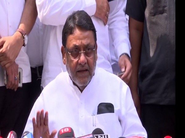 Nawab Malik speaking to reporters in Mumbai on Monday. 