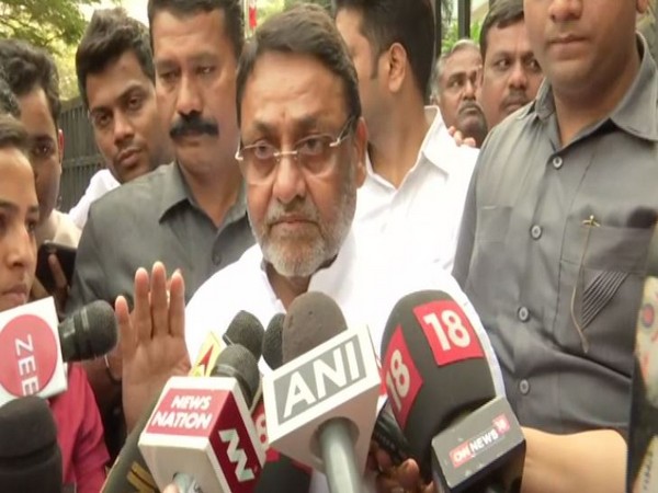 NCP leader Nawab Malik speaking to reporters in Mumbai on Tuesday. Photo/ANI