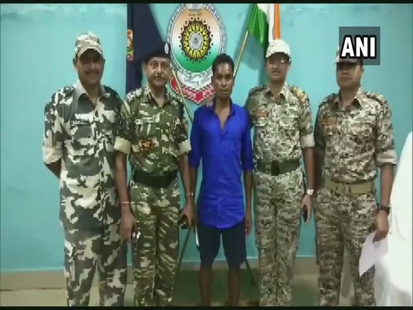 Naxal deputy commander Muchaki Budra surrenders before security forces in Dantewada, Chhattisgarh on Sunday.