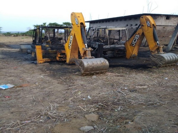 Road construction vehicle torched by Naxals in Bihar's Gaya on Thursday. (ANI photo)