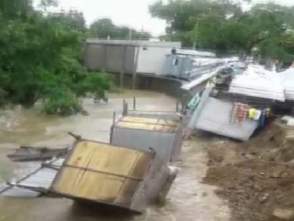 Multiple shops collapsed instantly into a canal in Neemuch district on Friday. Photo/ANI