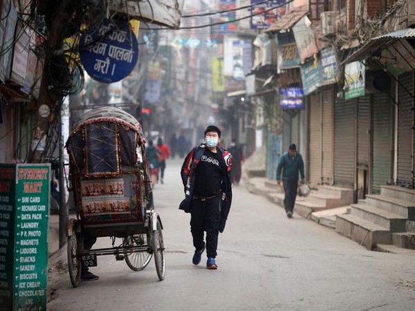 A man wears a mask as a preventive measure against the coronavirus outbreak in Kathmandu