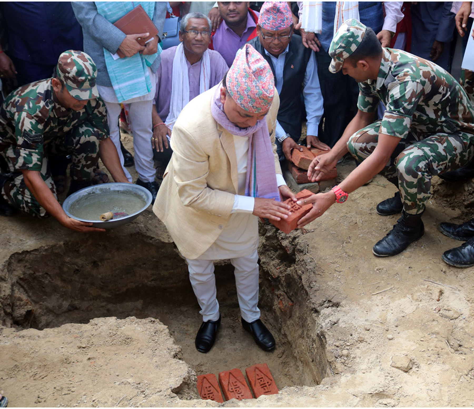 Deputy Prime Minister and Minister for Defence Ishwor Pokharel lays foundation stone of ‘Janata Awas’ reconstruction programme on Saturday.