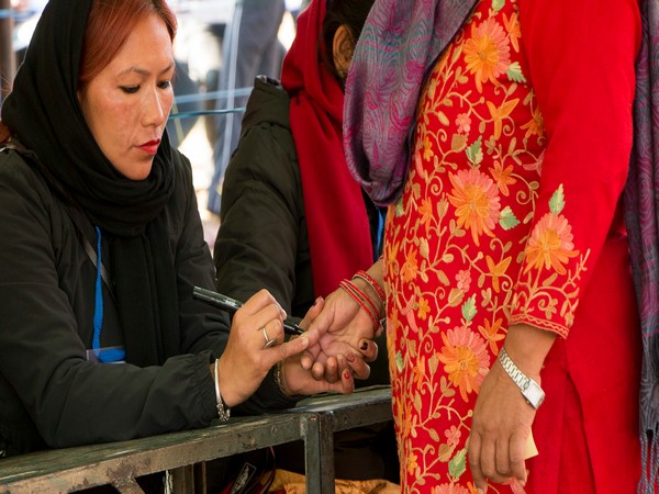 A resident casts her ballot in Bhaktapur