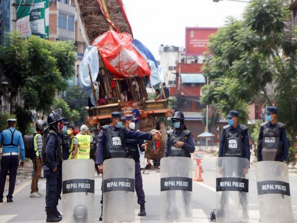Police deployed in Pulchowk to prevent any large congregation during the Rato Machindranath Jatra. Photo/ANI