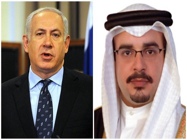 Israeli Prime Minister Benjamin Netanyahu (L) and Bahrain's Crown Prince Salman bin Hamad Al Khalifa (R)