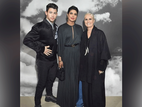 Nick Jonas, Priyanka Chopra Jonas and Maria Grazia striking a pose at Paris Fashion Week (Image courtesy: Instagram)