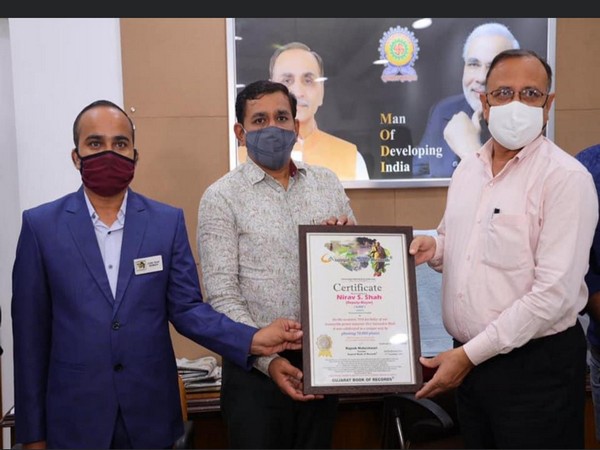 Nirav Shah receives GUJARAT BOOK OF RECORD for planting 70000 trees on the occasion of PM Narendra Modi's birthday