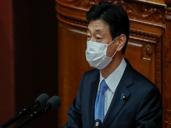 Japan's Economic Revitalisation Minister and in charge of country's coronavirus response, Nishimura Yasutoshi. (Photo Credit - Reuters)