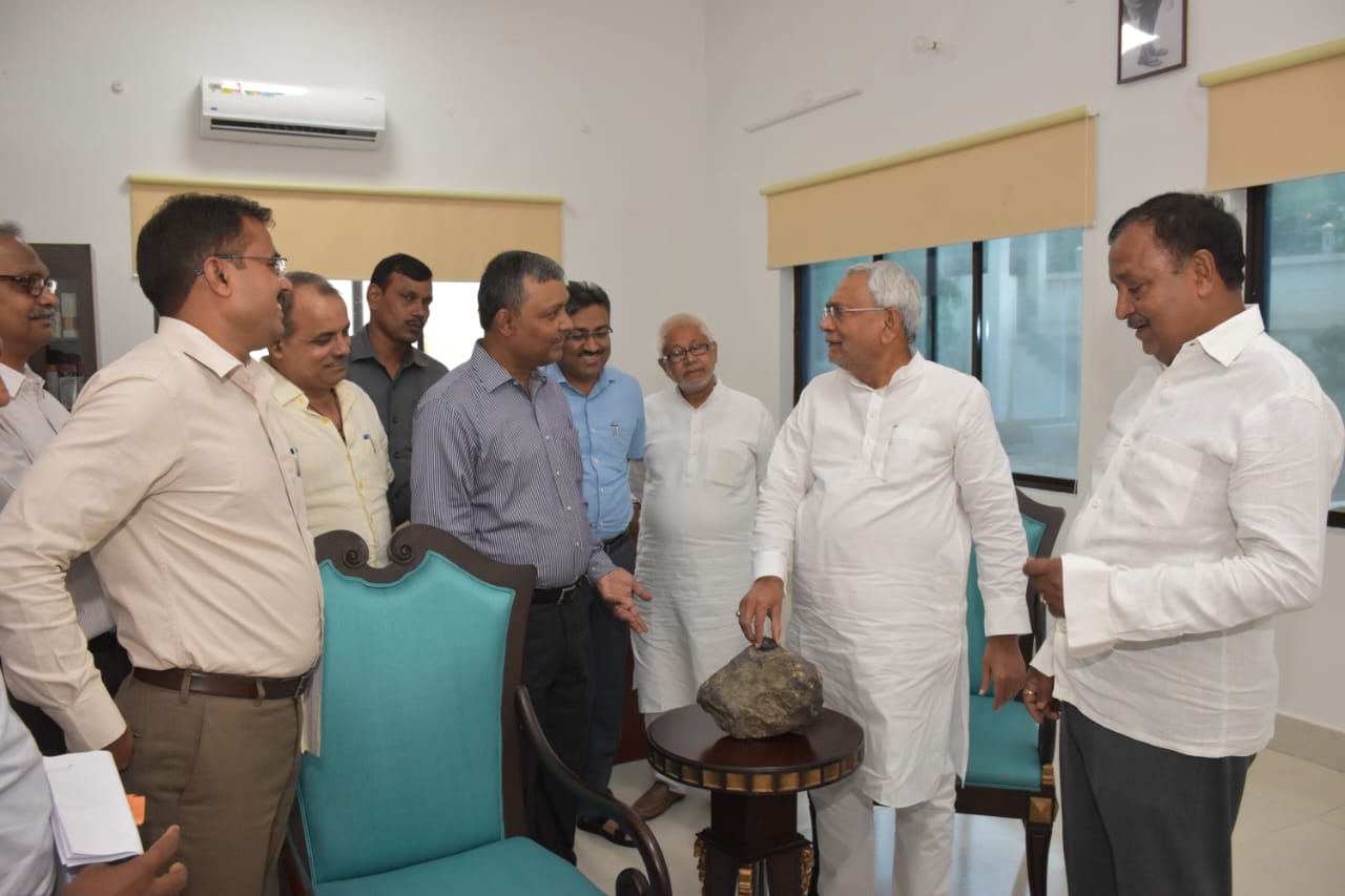 Bihar Chief Minister Nitish Kumar inpects the recently discovered meteorite in Madhubani on Wednesday. Photo/ANI