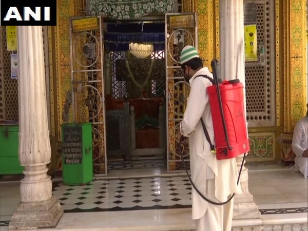 Hazrat Nizamuddin Dargah premises being sanitised on Friday. Photo/ANI