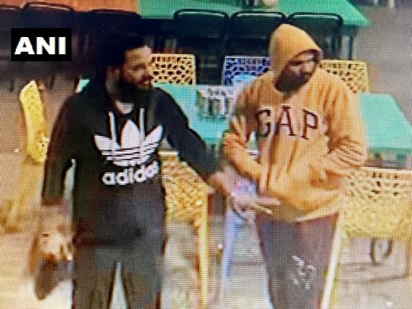 The man in the black shirt fled away with two INSAS assault rifles belonging to the sentries guarding the (AEC) Training Centre in Pachmari on Friday. (Photo/ANI)