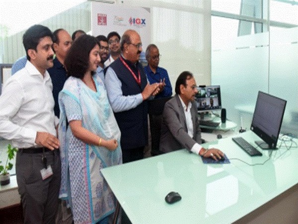 ONGC Director (Onshore) In-charge marketing Anurag Sharma doing the first gas trading on IGX. (Photo/PIB)
