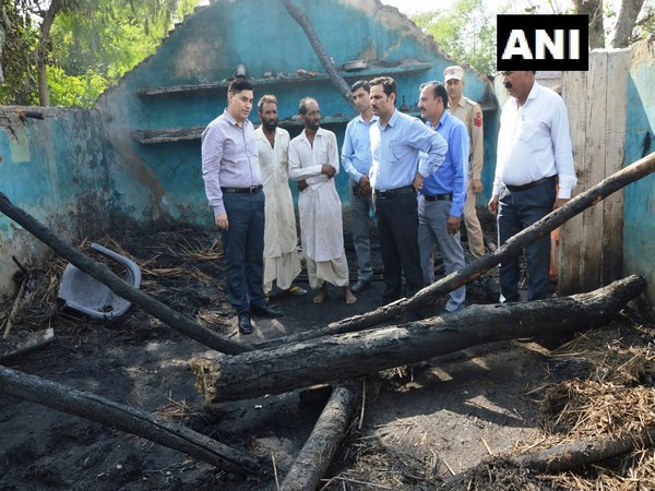 Kathua Deputy Commissioner O P Bhagat inspecting damages caused due to cross border firing on Sunday. Photo/ANI