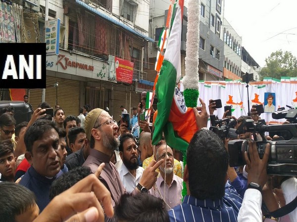 AIMIM chief Asaduddin Owaisi hoisting the flag on Thursday in Hyderabad. Photo/ANI