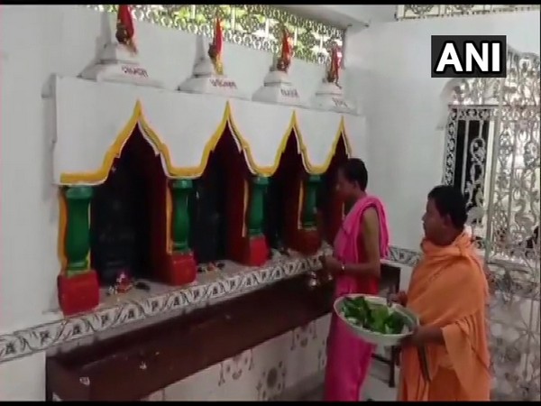 Priests perfrom prayers in temple in Odisha on Nuakhai Festival on Monday. Photo/ANI 