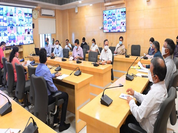 Odisha Chief Secretary Asit Tripathy conducts a district-wise review of the COVID-19 situation. Photo/ANI