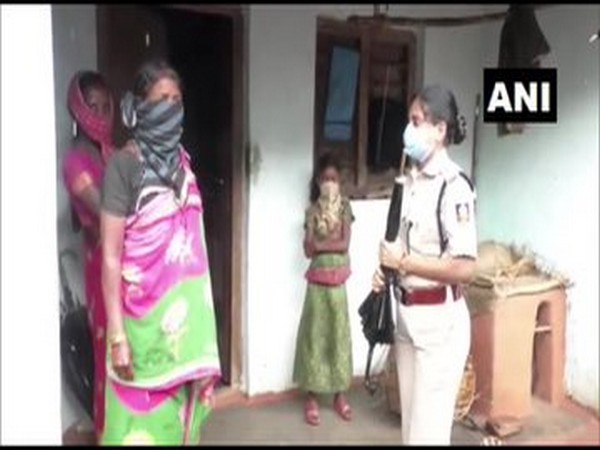 IPS officer and Superintendent of Police of Gajapati, Sarah Sharma interacts with villagers in Odisha. Photo/ANI