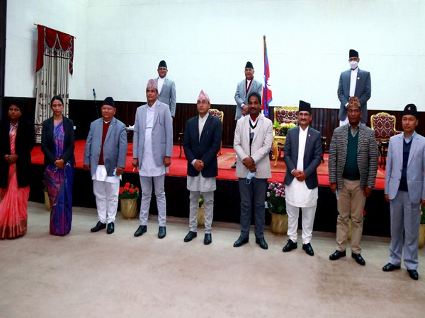 KP Sharma Oli, Prime Minister of now caretaker government, on Friday inducted eight newly appointed ministers. (Photo/ANI)