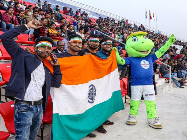2018 Men's Hockey World Cup mascot Olly in stands holdin Indian flag (Photo/Hockey India Twitter) 