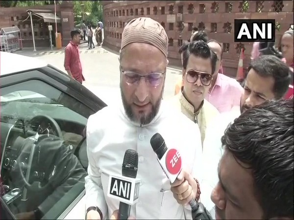 AIMIM MP Asaduddin Owaisi speaking to reporters outside the Parliament on Friday.