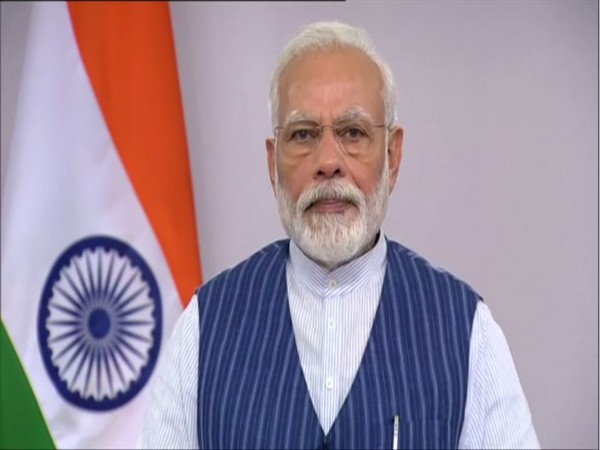 Prime Minister Narendra Modi addressing people of his Lok Sabha constituency, Varanasi, via video conferencing, on Wednesday.