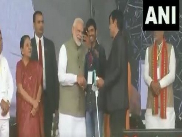 The youth taking selfie with Prime Minister Narendra Modi on Saturday. Photo/ANI