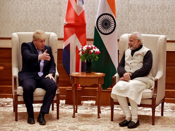 Prime Minister Narendra Modi (right) with his UK counterpart Boris Johnson (file photo/Reuters)